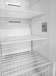 4 wire shelves, 4 door bins, 1 large lower basket, convertible to/from refrigerator/freezer